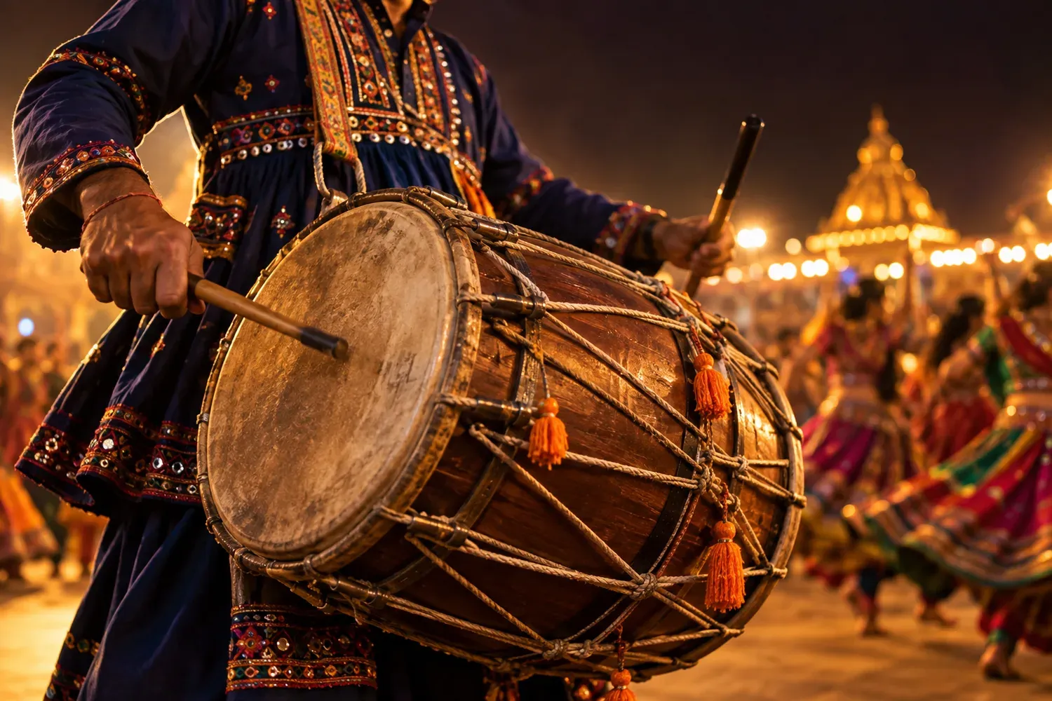 Illustrative dhol performance surrounded by the warm lights of a Garba celebration